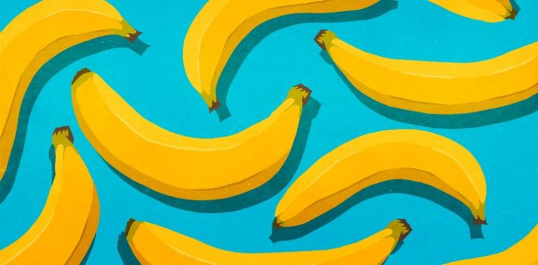 A drawing of yellow bananas on a light blue background.